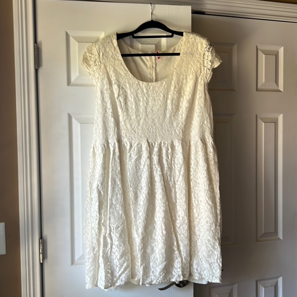Off-white lace dress.